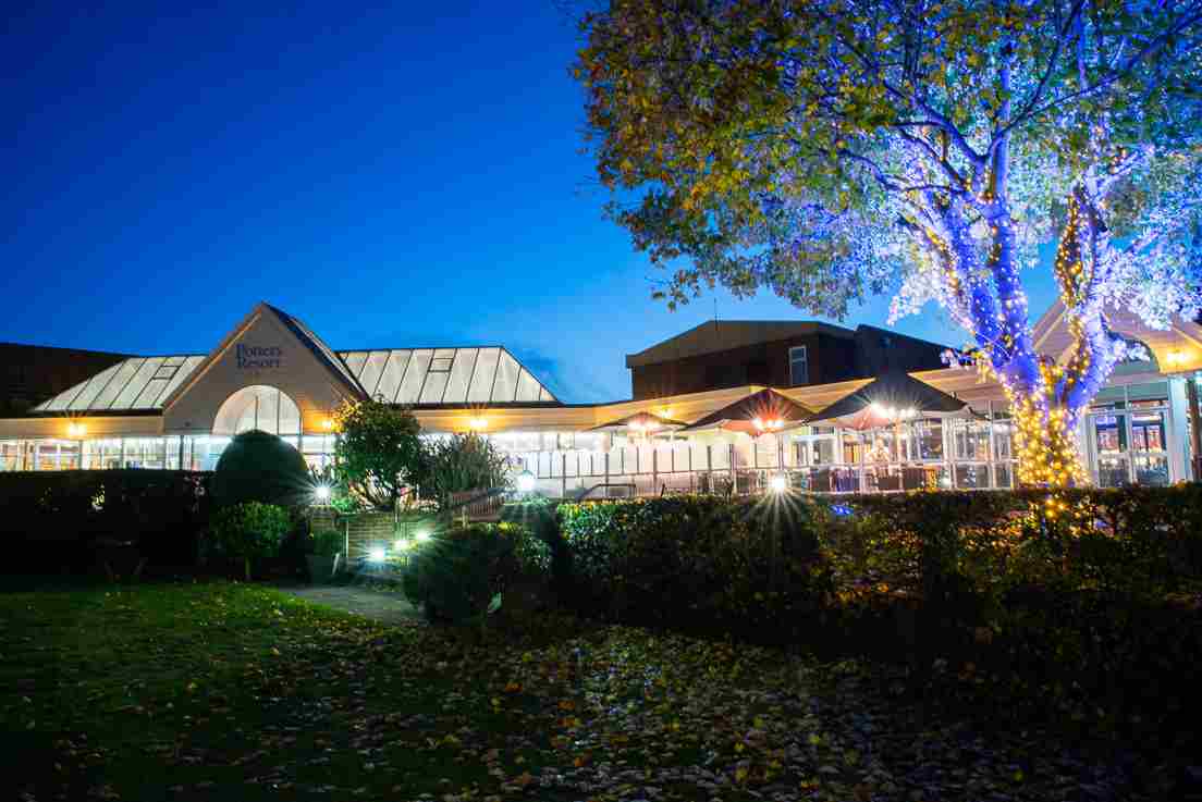 Outdoor photograph of reception area of Potters Resort in Hopton-on-Sea